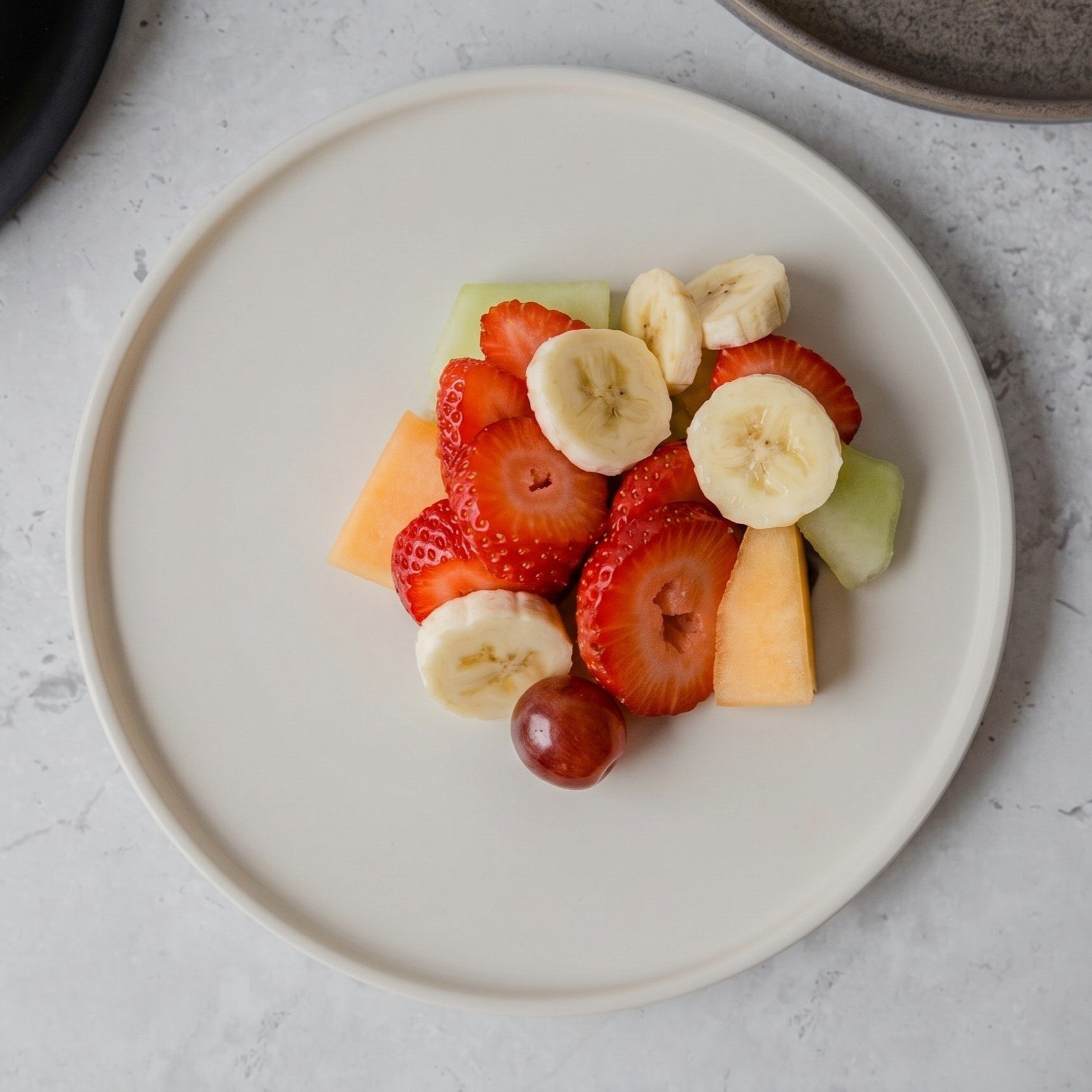 Small Side of Fresh Cut Seasonal Fruit.